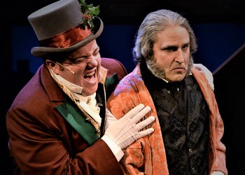 Bobby Montaniz as Christmas Present with Jeffery Sanzel as Scrooge in 