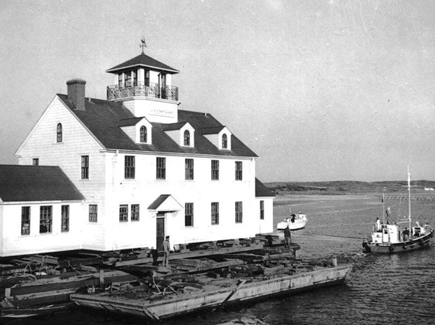 Towing the Coast Guard station, March, 1955