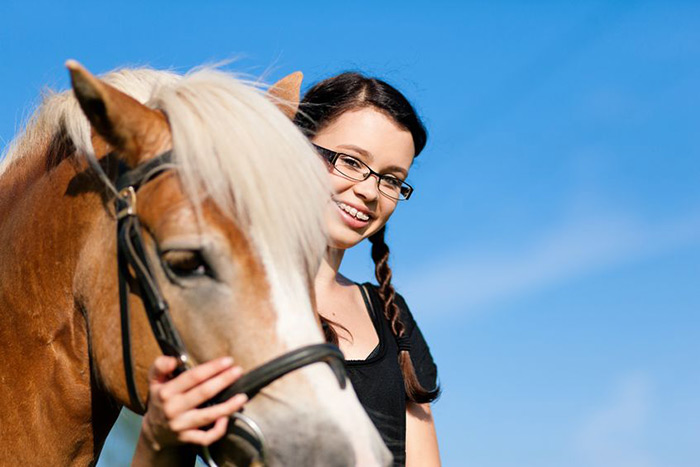 teen girl with horse