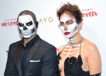 Casper Smart and Jennifer Lopez went as skeletons to Heidi Klum's Halloween party.