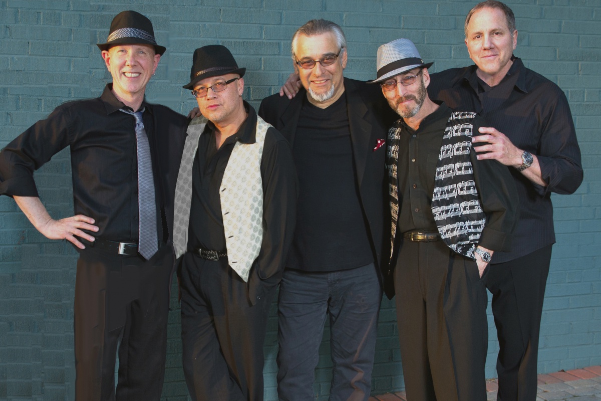 The Hit Men come to Guild Hall August 25.