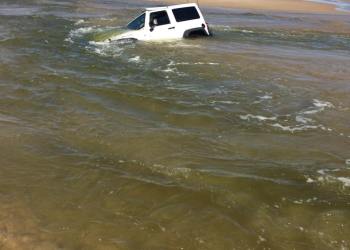 Jeep stuck in Georgica Pond, East Hampton, The Hamptons