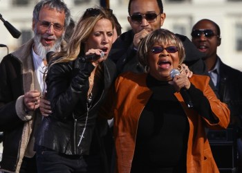 Mavis Staples performs with Sheryl Crow, Yusuf Islam and John Legend at the Rally To Restore Sanity And/Or Fear on the National Mall on October 30, 2010 in Washington, DC.