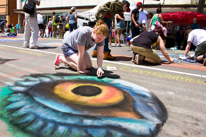 Kimberly Guthrie at the 2014 East End Arts Council Community Mosaic Street Painting Festival.
