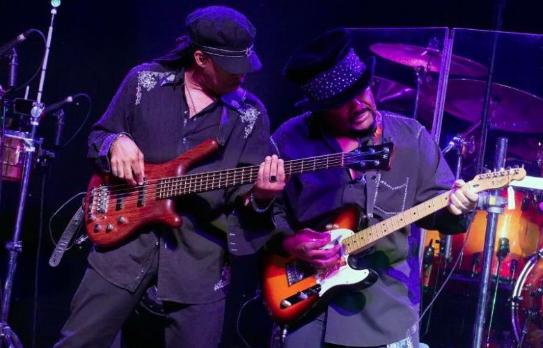 The Sunshine Band's bass guitarist Stephen Lashley with lead guitarist Jeffrey Reeves jamming.
