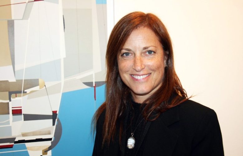 Mindy Solomon, owner of the Mindy Solomon Gallery, at her booth on Saturday