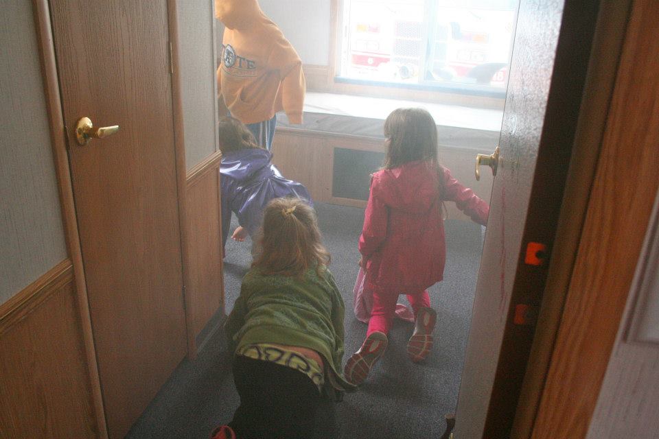 Southampton Elementary School students escape from a simulated smoke-filled room.