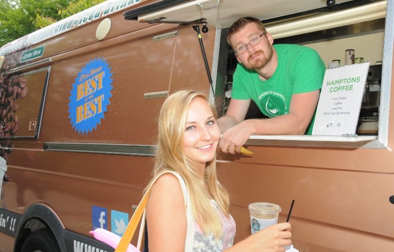Hampton Coffee Company's Taylor Merrill served his "Dan's Best of the Best" Coffee to Agata Czerwinska