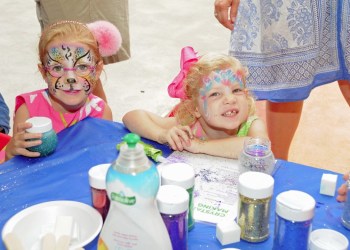 Grace and Catherine Villar made crystal balls at the 2014 CMEE Family Fair.