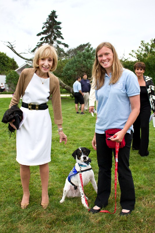 Victoria Khan and Southampton Animal Shelter trainer Jodie Cameron with Duster.