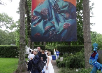 durell-godfrey-in-front-of-photo-by-cindy-sherman