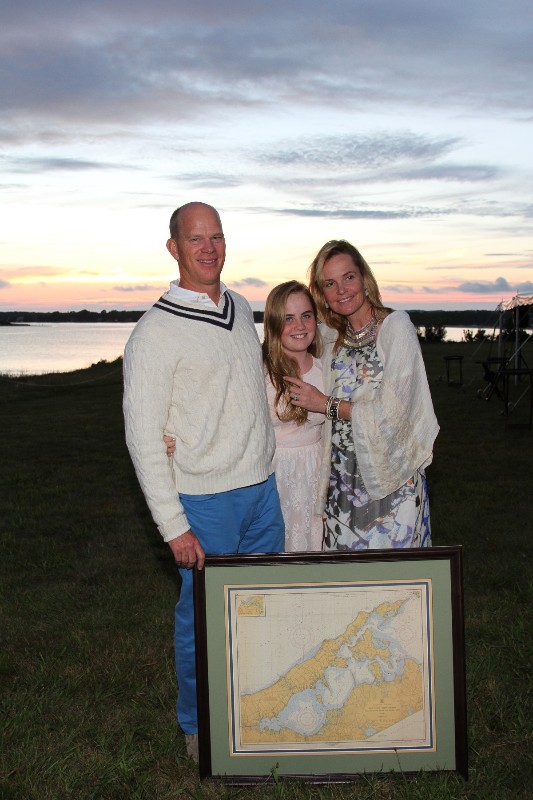 Hosts Rich Hogan and Carron Sherry with one of their children