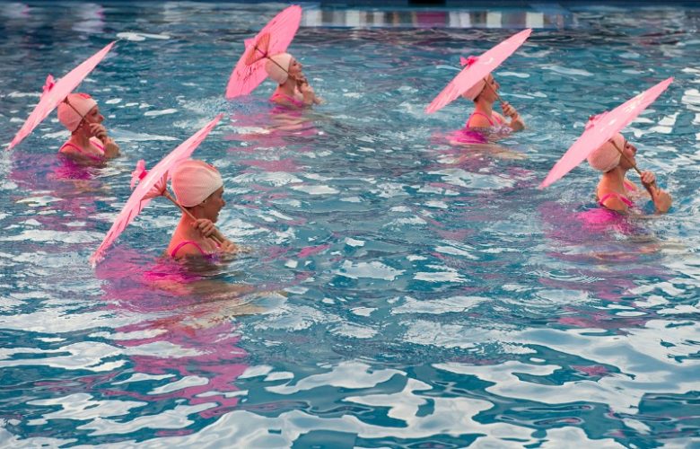 Water Works, the synchronized swimmers, performed to the delight of all.
