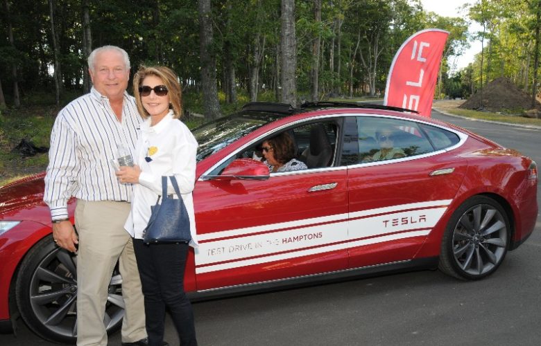 Bruce Meltzer and Diane Lederman prepared for their Tesla test drive