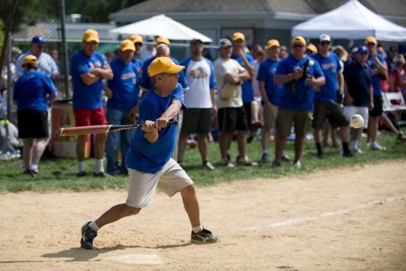 Veteran of the Artists and Writers Game Mike Lupica at bat for the Writers.