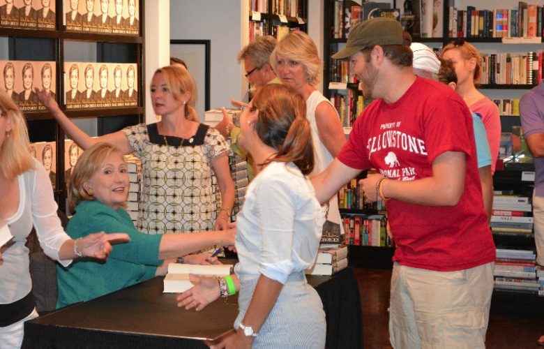 Hillary Clinton autographs "Hard Choices" for fans