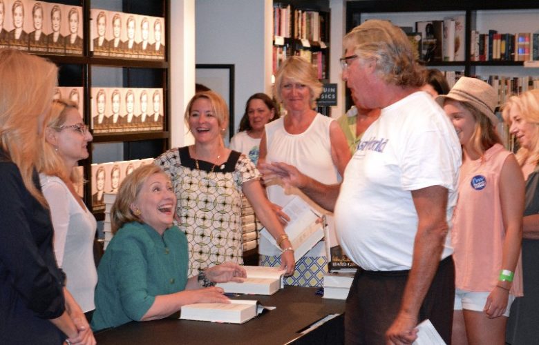 Hillary Clinton and a man who endorsed her in 2008.