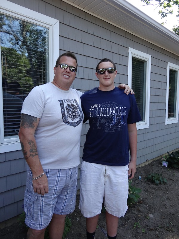 Chris (Farrell Building) and his son C. J. Perrier