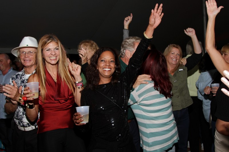 Hands in the air as New Life Crisis sings cover songs from the past and present.