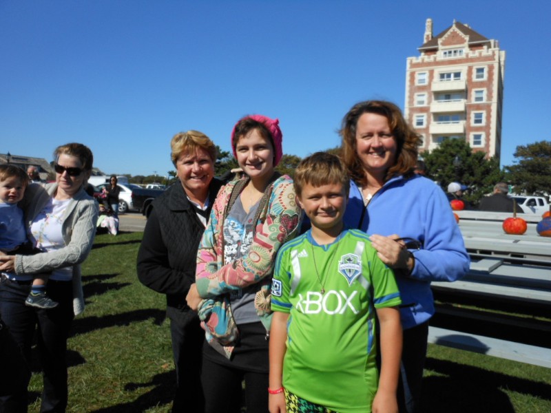 Montauk resident Chris Herbert, formerly owner of Herb's Market on Main Street, enjoying the fall festival with her daughter Gail Gregorio and grandchildren Gianna and David Gregorio.