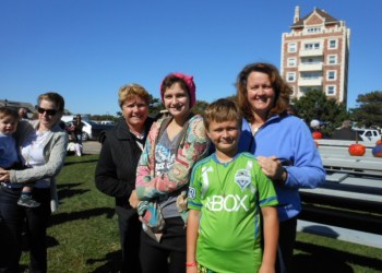 Montauk resident Chris Herbert, formerly owner of Herb's Market on Main Street, enjoying the fall festival with her daughter Gail Gregorio and grandchildren Gianna and David Gregorio.