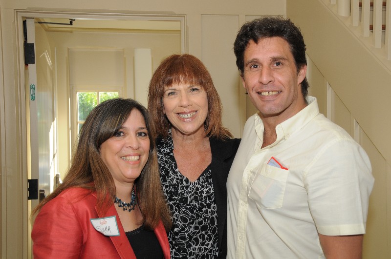 Sara Blue of Maureen's Haven, Maureen's Haven executive director Tracey Lutz and Michael