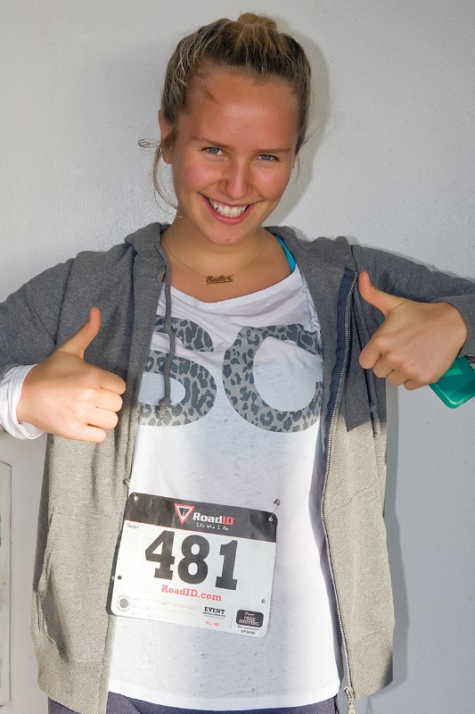 Ready to stretch her legs, Sailor Brinkley-Cook awaiting the start of the Run for Ross 5K.