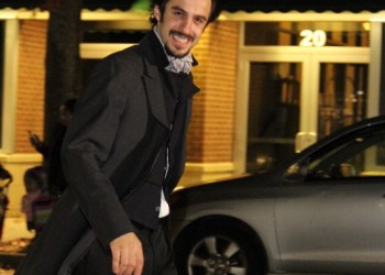  Actor portraying Edgar Allan Poe greets the crowd on Main Street