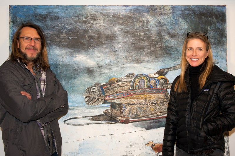 Illustrator Peter Spacek with the lovely Arden Spacek, in front of one of Paton Miller's paintings