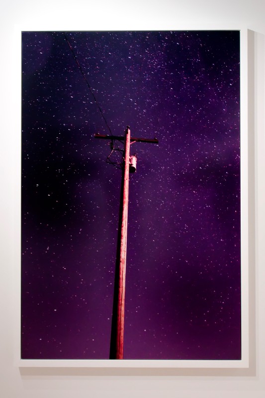 Ryan McGinley, one of the youngest artists to show at the Whitney, presented "Night Sky" a photograph of a single telephone pole seen against an evening sky.