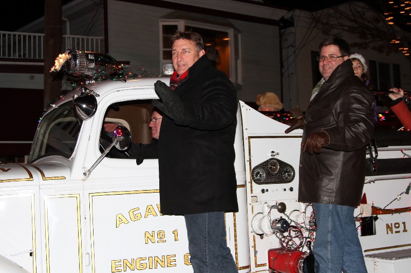 Mayor Mark Epley smiles as he waves to the crowd