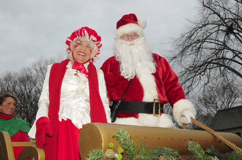Carol Kroupa in the sled with Santa Claus Dan Rattiner