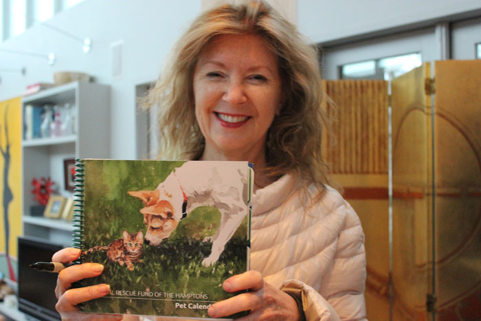 April Gornik with the ARF Calendar she designed.