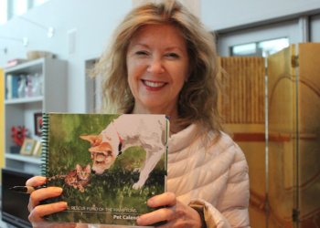April Gornik with the ARF Calendar she designed.
