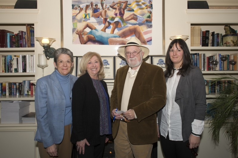 Amy Deak, Diane Strecker and Angela Pokorny read their short stories seen here with Dan Rattiner by the fire at the Southampton Inn.