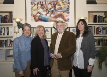 Amy Deak, Diane Strecker and Angela Pokorny read their short stories seen here with Dan Rattiner by the fire at the Southampton Inn.