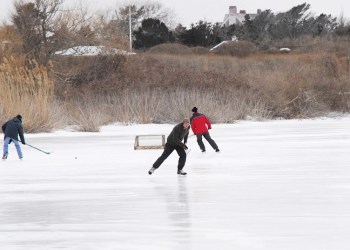 Ice hockey on Old Town Pond in Southampton Village.