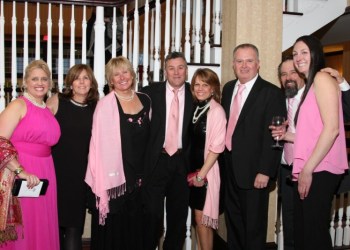 Guests attending the inaugural Pink Pearl Gala posed for a photo before dinner