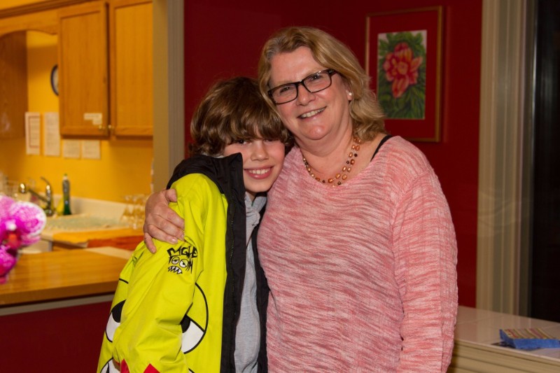 Aiden gives his former teacher Nancy Remkus a big hug