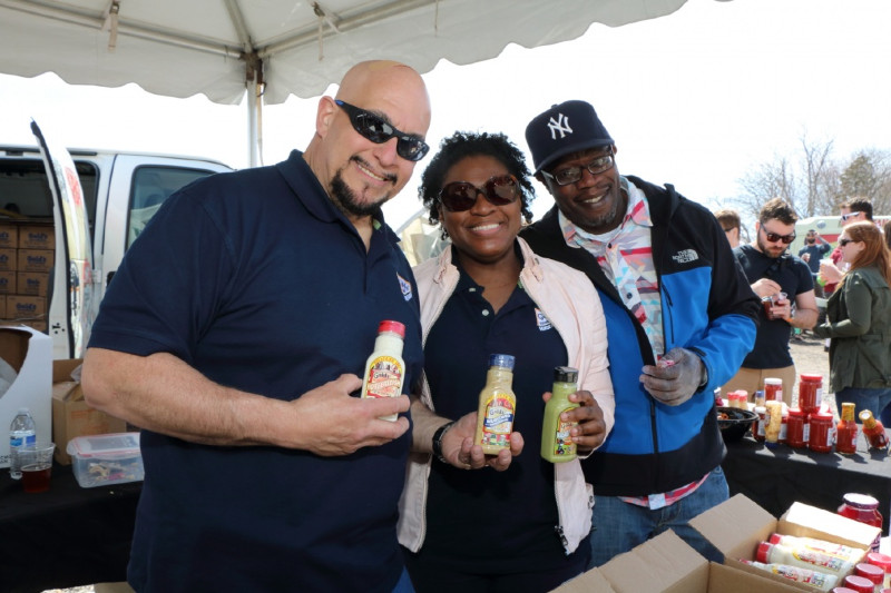 Paul Altamore, Lesann Brown, and Curtis Williams of Gold's Mustard, one of the primary sponsors of the Horseradish Festival.