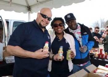Paul Altamore, Lesann Brown, and Curtis Williams of Gold's Mustard, one of the primary sponsors of the Horseradish Festival.