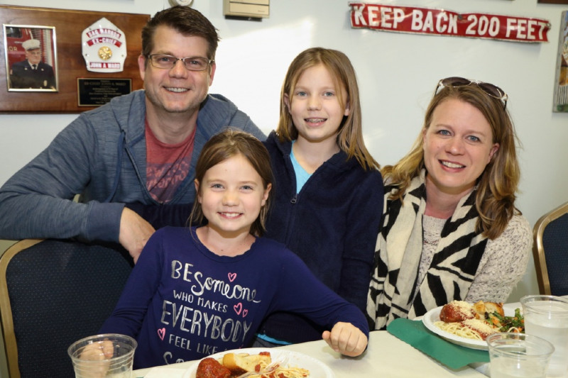 Pastor Mark Middlekauff of the Grace Presbyterian Church in Water MIll, and his daughters Lily, Ella and wife Lesley.