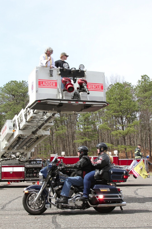 Shrine of Our Lady of the Island Director Rev. Hugh Gillespie, SMM blesses the riders and their motorcycles