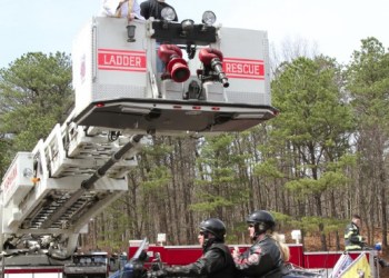 Shrine of Our Lady of the Island Director Rev. Hugh Gillespie, SMM blesses the riders and their motorcycles
