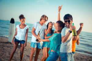 Group of Friends Having a Party at Beach