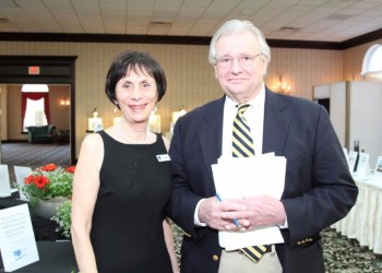 East End Arts Board of Directors Secretary Annika Shapiro, auctioneer Henry Broggi