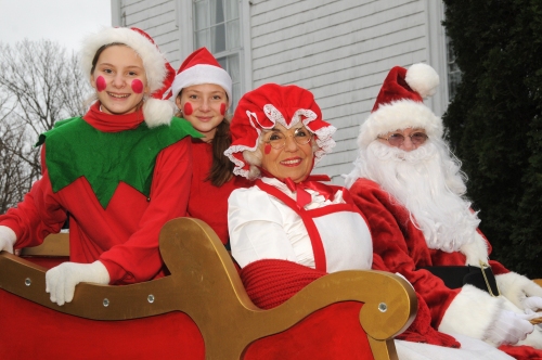 This year's Santa's Sled passengers: Julie Ehm, Marion Lynn, Carol Kroupa (Mrs. Claus) and, of course, Santa (with the eyes of Dan's Papers Founder Dan Rattiner!) Blurb: On Saturday, Main Street and Newtown Lane in East Hampton Village were closed to make way for the Annual East Hampton Chamber of Commerce Santa Parade. There were firetrucks, Girl and Boy Scouts, antique cars, a donkey, Mr. and Mrs. Santa Claus...something for everyone. Download Credit: Richard Lewin Richard Lewin Details: (Front to back) Andrea Rangel, Kaylah Smiley, Vicky Chen, Mia Mussio, Brionna Forrester and Laura Sisco (YMCA Pre-school Dance Class Teacher) Download Credit: Richard Lewin Richard Lewin Details: Key Club of East Hampton High School: Raya O'Neal, Christina Cangelosi, Ellie Cassel, Morgan Gaugler, Annie Schuppe, Megan McCaffrey and Lily Goldman