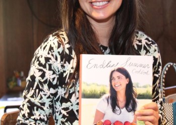 Katie Lee with her newest cookbook, 