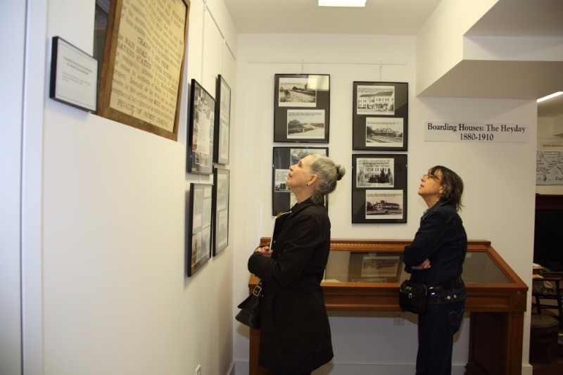 Visitors explore the Lower Level of the Quogue Historical Society Pond House