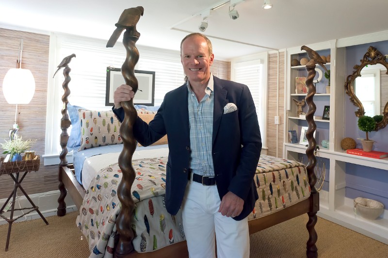 Designer Mark Schryver's showhouse designer room was inspired by Tippy Hedron, a life long animal advocate, featuring cat and bird images like the birds on the bedposts.